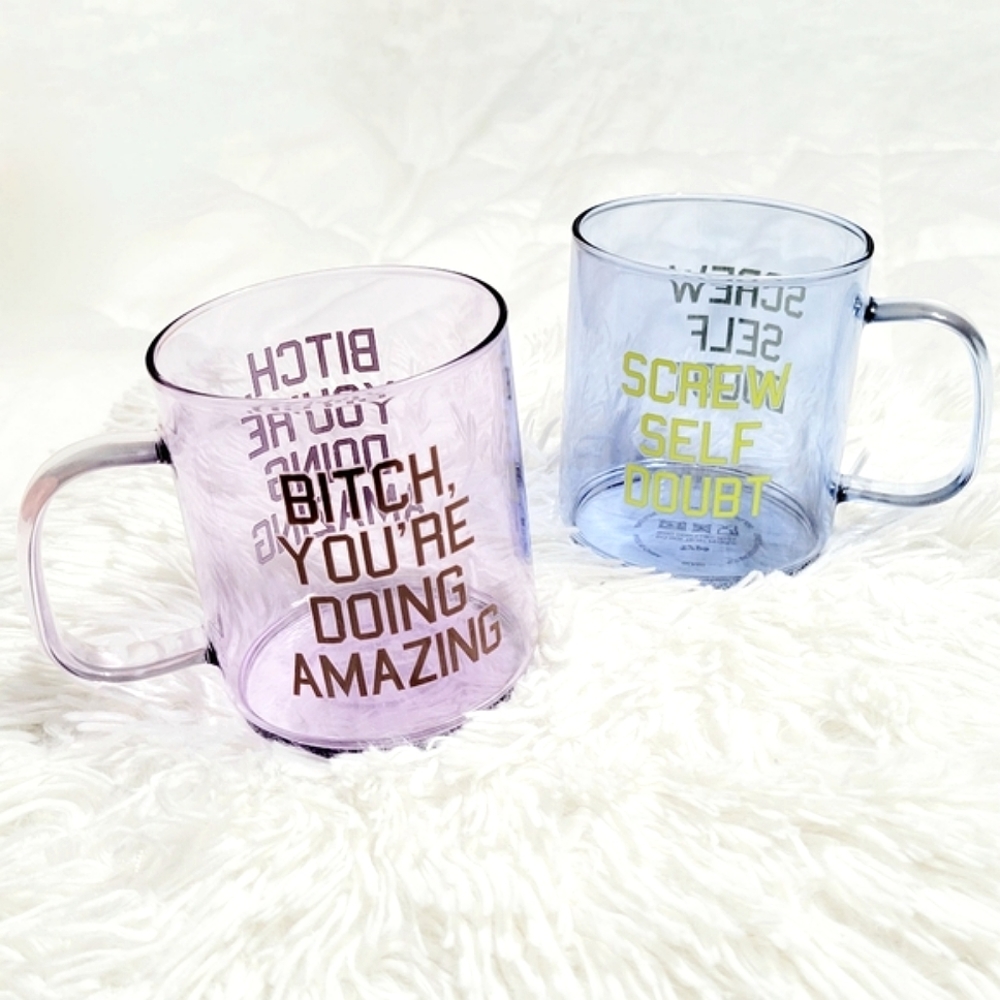 Two glass mugs with handles